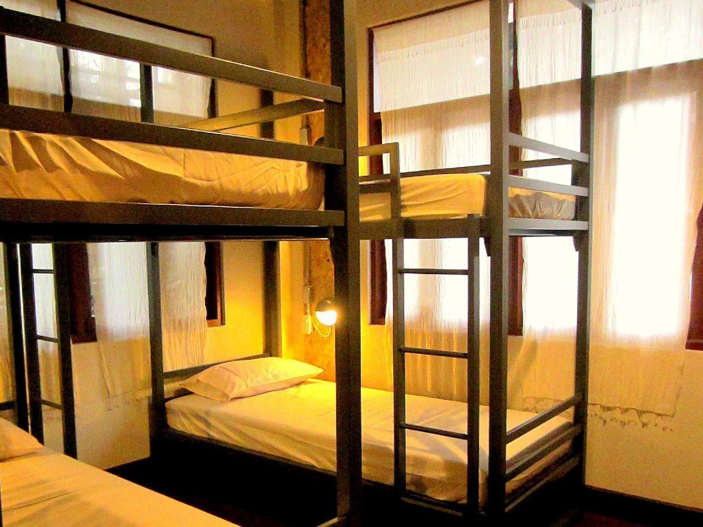Wooden bunk beds at Chiang Mai D Hostel