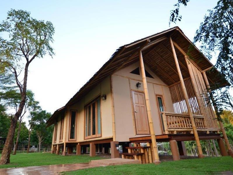 Raised timber accommodation in the gardens at Isaree Secret Garden