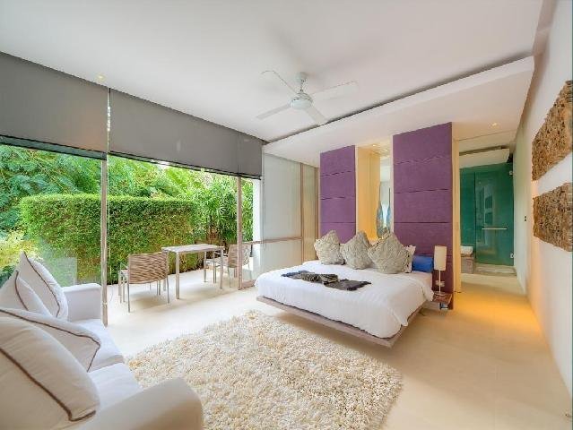 Bedroom with terrace doors at Samujana Villa 8