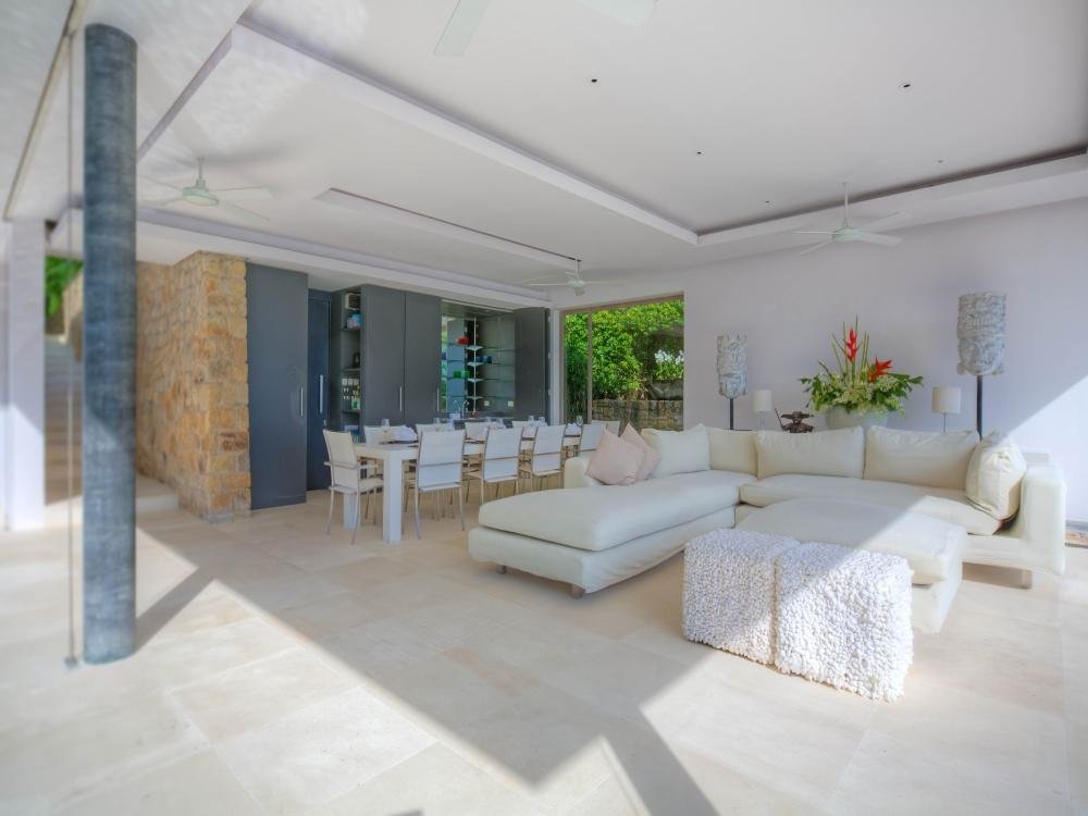Open-plan lounge and dining area at Samujana Villa 8