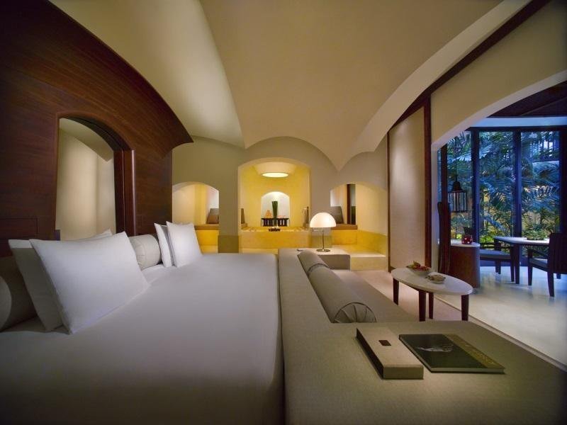 Suite bedroom and seating area at The Barai