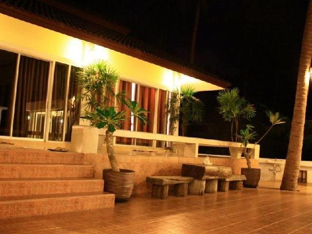 Illuminated terrace and entrance steps at The Theatre Villa