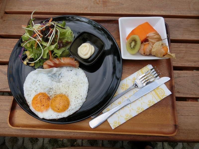 Breakfast presentation photographed at Yellow Pillow Hotel